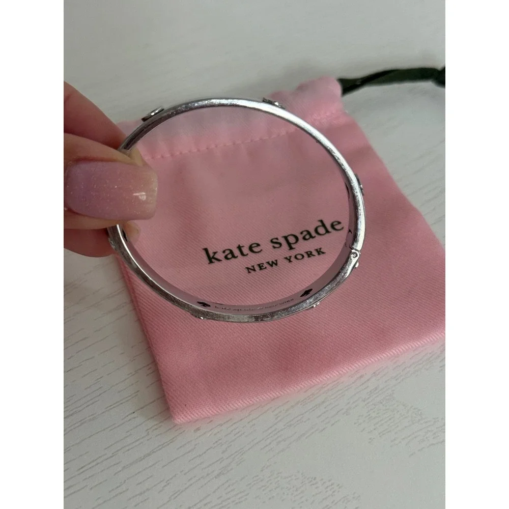 Kate Spade New York Silver Tone Spade Logo Hinged Bangle Bracelet with Dust Bag